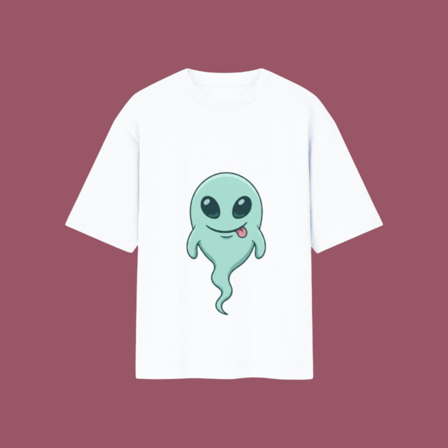 Flat-lay mockup of an oversized white t-shirt featuring a cute, smiling green alien ghost graphic from the anime Dan Da Dan, displayed against a solid mauve background.