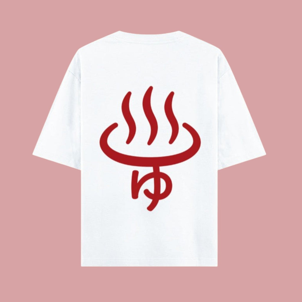 Flat lay mockup showing the back of a white short-sleeve t-shirt against a pink background. It features a bold red graphic of a Japanese hot spring symbol with the hiragana character 'yu' beneath it, inspired by the Dan Da Dan anime.